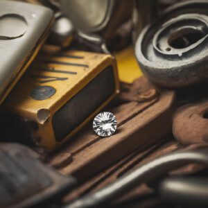 Sparkling diamond amongst old tools, illustrating marketing for unsought products.