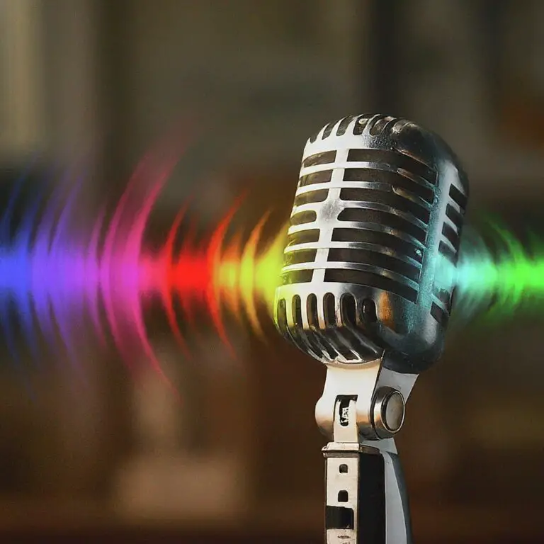 Vintage microphone with colorful sound waves symbolizing the impact of PR in marketing.