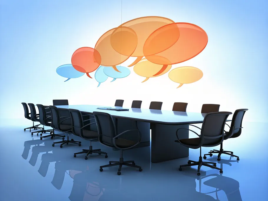 A minimalist illustration of a modern conference room with empty chairs and colorful speech bubbles above them.